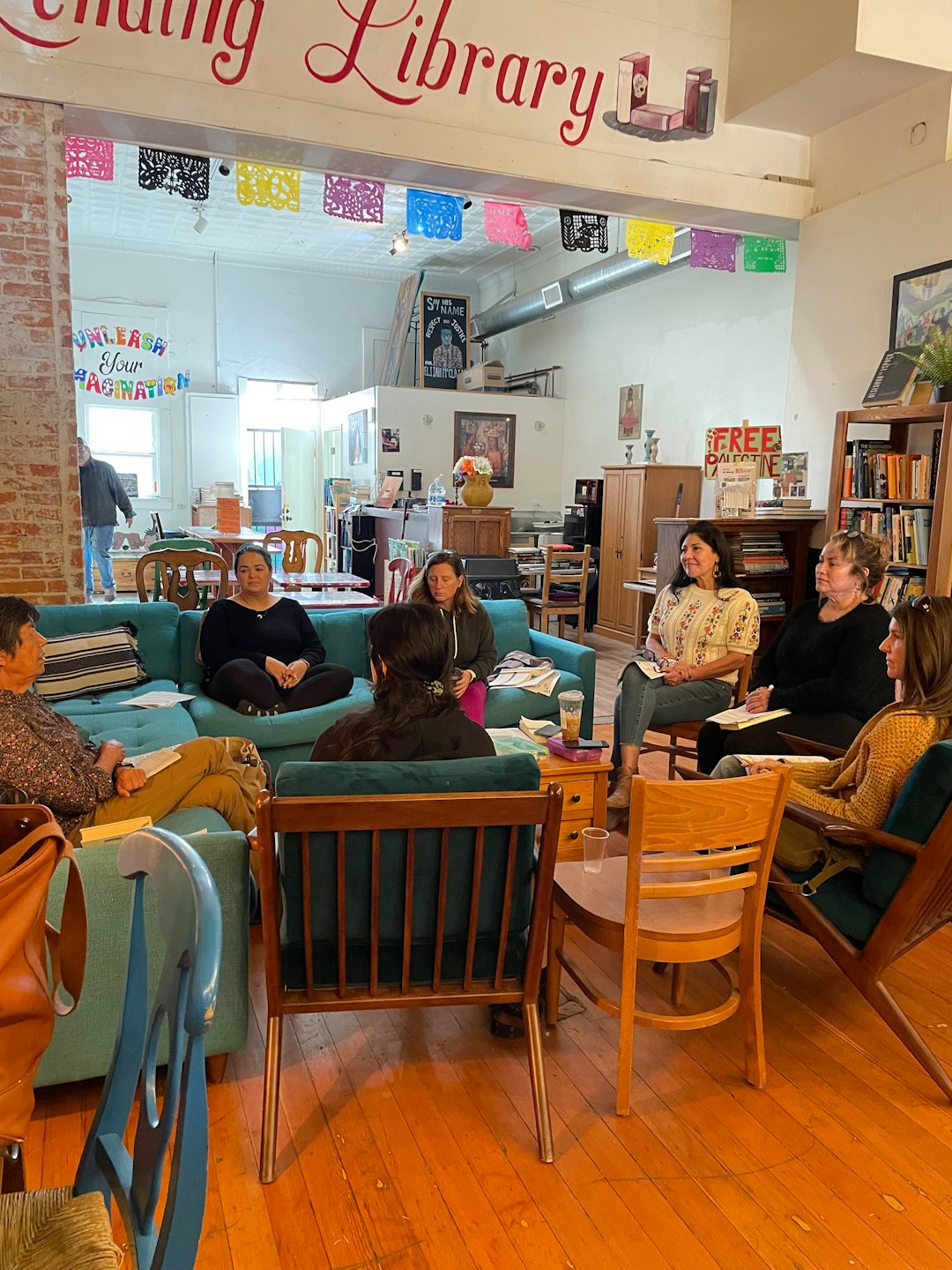 A group of women meeting in a community library.